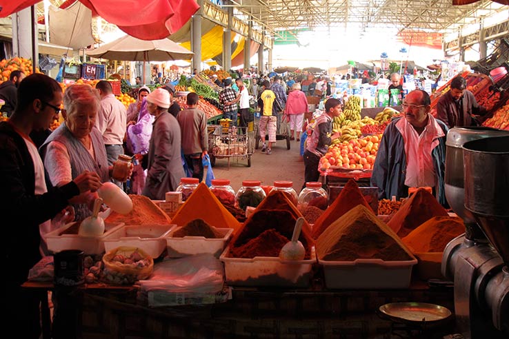 Fly to Agadir, visit the Souk El Had market place.